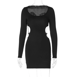 Detail of waist cut-out with tie-up straps on black long sleeve bodycon dress