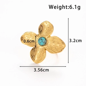 Gold flower ring with turquoise inlay and detailed size measurements on white background