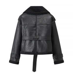 Detail view of the faux fur collar and adjustable waist belt on a black biker jacket