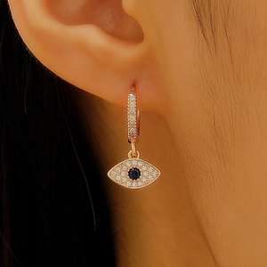 Gold evil eye hoop earrings with blue zircon center and sparkling white stones