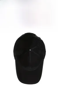 Close-up of winter baseball cap with thick quilted lining and fold-down ear protection