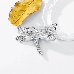 Silver dragonfly alloy brooch with filigree wings and emerald green rhinestones decoration