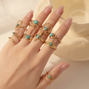 Bohemian gold stainless steel rings with tiger eye stones and skull eye motifs