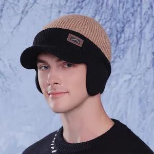 Winter knit baseball cap with ear flaps and warm lining for cold outdoor cycling