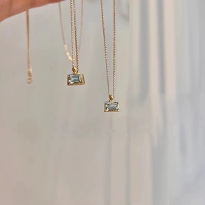 Minimalist 925 sterling silver necklace with a rectangular light blue aquamarine pendant