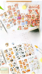 Vue détaillée de divers autocollants mignons en PET de chiens pour le scrapbooking DIY