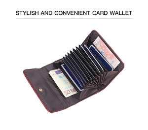 Detail view of burgundy crocodile pattern card wallet with accordion-style compartments