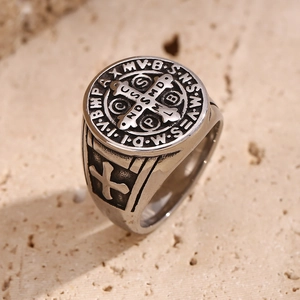 Macro view of vintage Saint Benedict cross signet ring in antique silver finish