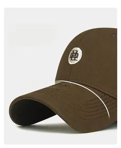 Close-up of wide-brimmed baseball cap with embroidery and premium twill texture