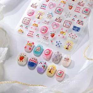Macro detail of M-1140 nail stickers featuring cartoon cats and strawberry designs