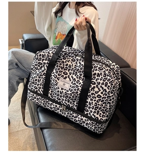 Sac de voyage léopard noir et blanc avec compartiment à chaussures et bandoulière réglable