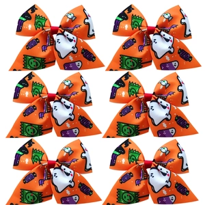 Set of 6 orange Halloween bows with ghost and candy prints on ribbed fabric