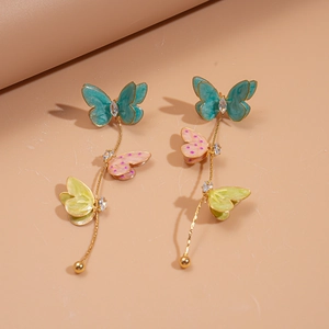 Détails de boucles d'oreilles papillons en émail multicolore et strass scintillants