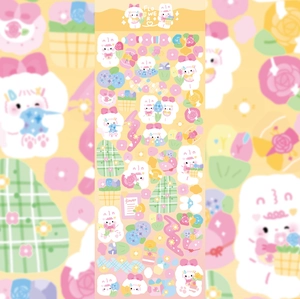 Close-up of cute cartoon flower stickers with laser glitter effect for DIY scrapbooking