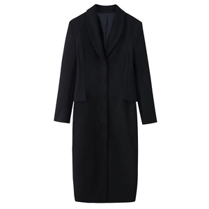 Detail of a black long wool coat featuring a shawl collar and slim waist design