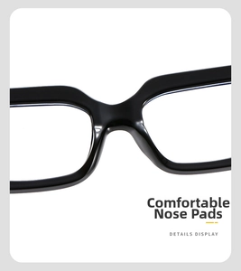 Detail of comfortable integrated nose pads on glossy black square glasses frame