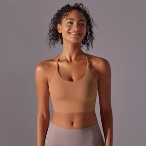 Close-up of naked-feel halter sports bra with racerback design in earthy tone finish