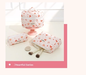 Three-piece quilted heart-patterned makeup bag set featuring a handle box and zip pouches