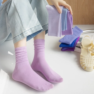 Colorful cotton blend ribbed mid-calf slouch socks for women in various trendy candy colors