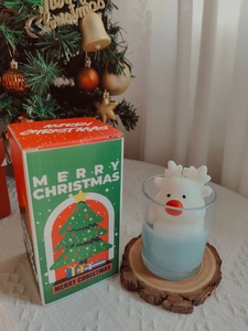 Christmas candle gift box with blue soy wax and white elk decor on wood base