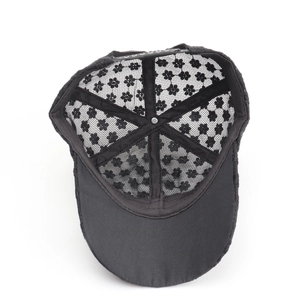 Women's black floral lace baseball cap showing inner mesh detail and adjustable strap