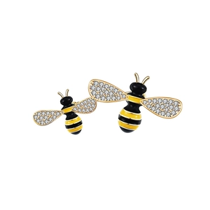 Detail of bee brooch with yellow enamel belly and wings set with clear cubic zirconia