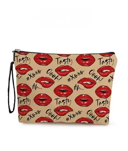 Detailed pattern view of canvas makeup bag with red lips and artistic xoxo typography