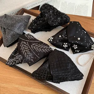 Elegant 5-piece black acrylic hair claw set with rhinestones, pearls and sequins