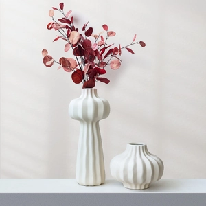 Minimalist white ceramic vase set with vertical ribbed texture for home decor