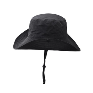 Close-up of black outdoor sun hat featuring adjustable windproof cord and waterproof fabric