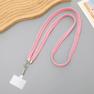 Detailed view of pink braided crossbody phone strap with durable metal lobster clasps