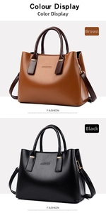 Detail shot of brown and black leather handbags with gold hardware and dual handles