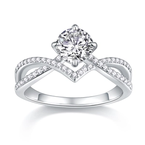 Macro shot of a twisted 925 silver ring with a round moissanite and micro-pave diamonds