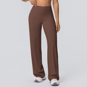 Detail of high-waist dark brown yoga pants showing elastic skin-friendly fabric and wide waistband