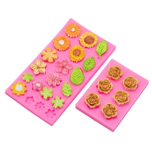 Pink silicone sunflower and rose flower molds for DIY clay and baking decoration