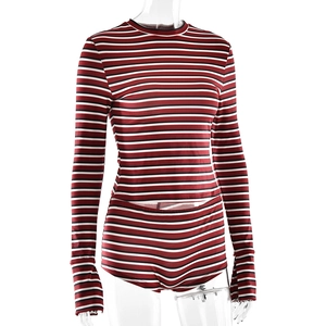 Detailed close-up of a striped two-piece set featuring a slim-fit top and matching shorts