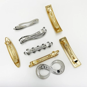 Detailed set of punk style irregular metal hair clips in gold and silver finishes