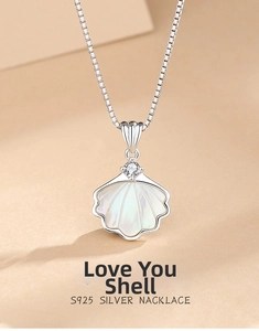 Detailed view of S925 silver shell pendant necklace with sparkling stone inlay