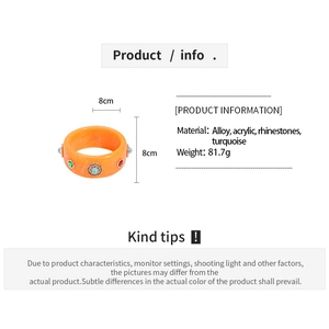 Detailed size and material specs for the orange acrylic turquoise bangle with dimensions