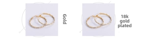 Close-up of wavy 18k gold plated hoop earrings with sparkling diamond accents
