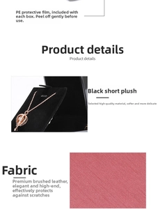 Detail view of red brushed leather necklace box with LED light and soft black plush interior