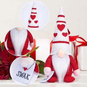 Valentine's Day gnome doll with heart hat holding a SWAK envelope gift decoration