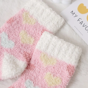 Pink coral fleece socks with yellow and white hearts, warm winter plush sleep socks