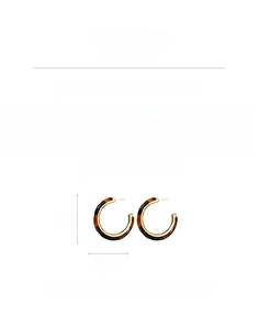 Detail view showing C-shaped resin leopard print earrings with size and weight specs