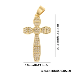 Macro view of gold cross pendant with dimensions 37.5x18mm and zircon inlay details