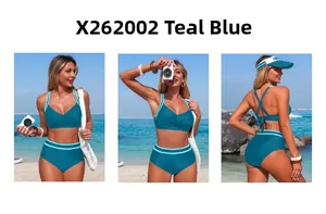 Detailed view of teal blue two-piece bikini with striped straps and crisscross back design