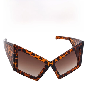 Detail of leopard print cat eye sunglasses featuring thick frames and gradient brown lenses