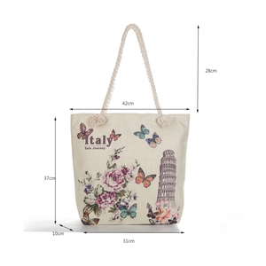Detailed dimensions of beige canvas tote bag with thick rope handles and sloth floral print