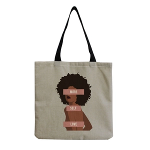 Detail of canvas tote bag showing linen texture and More Self Love portrait print