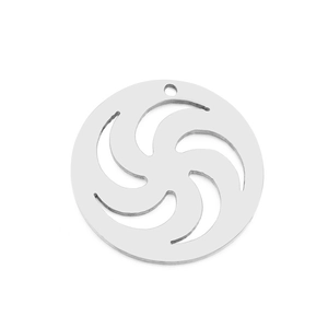 Macro view of a silver circular metal pendant with intricate hollow vortex patterns